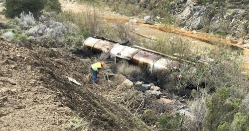 a tanker truck crashed next to a river